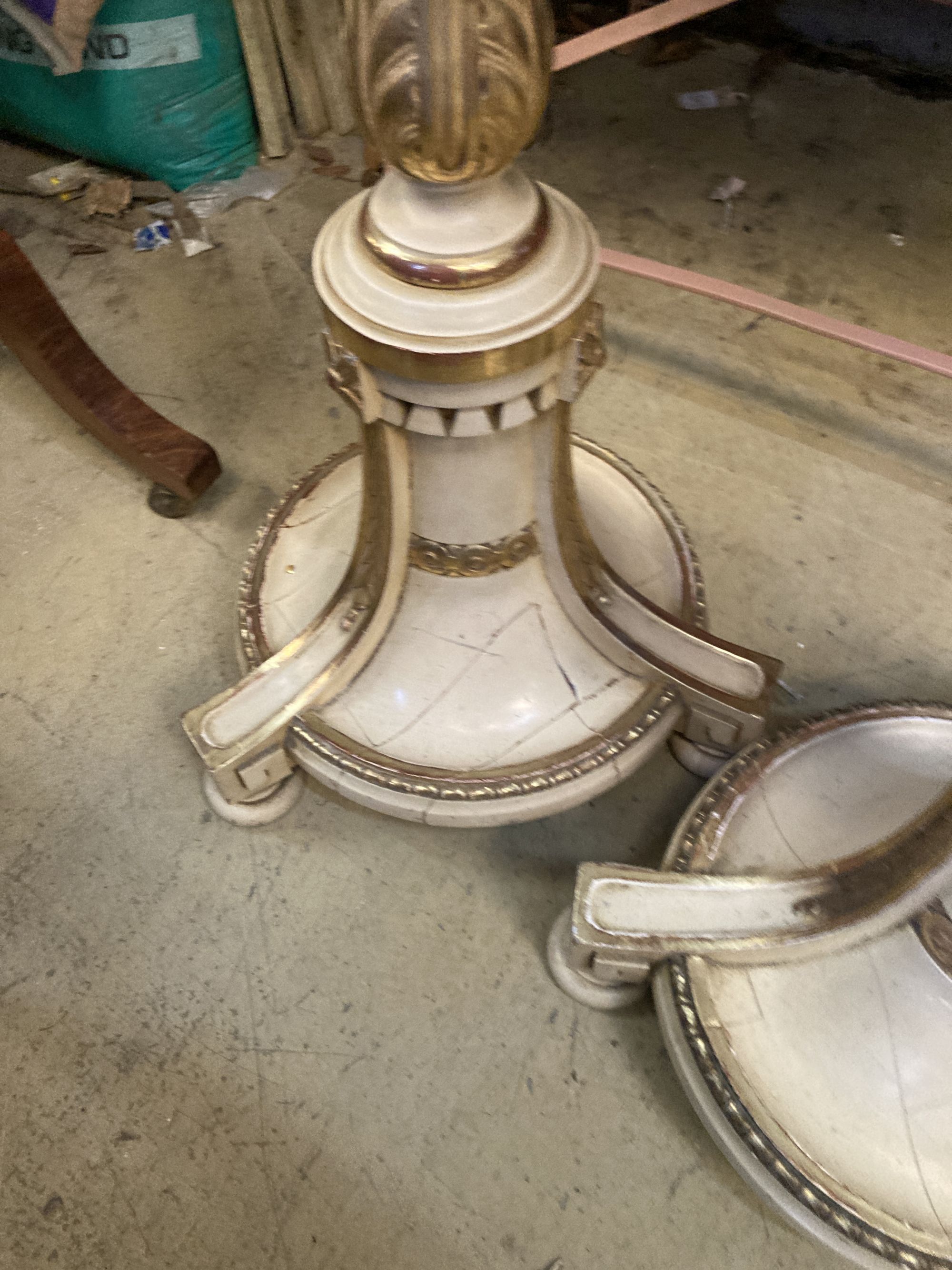 A pair of cream painted parcel gilt standard lamps, height 166cm